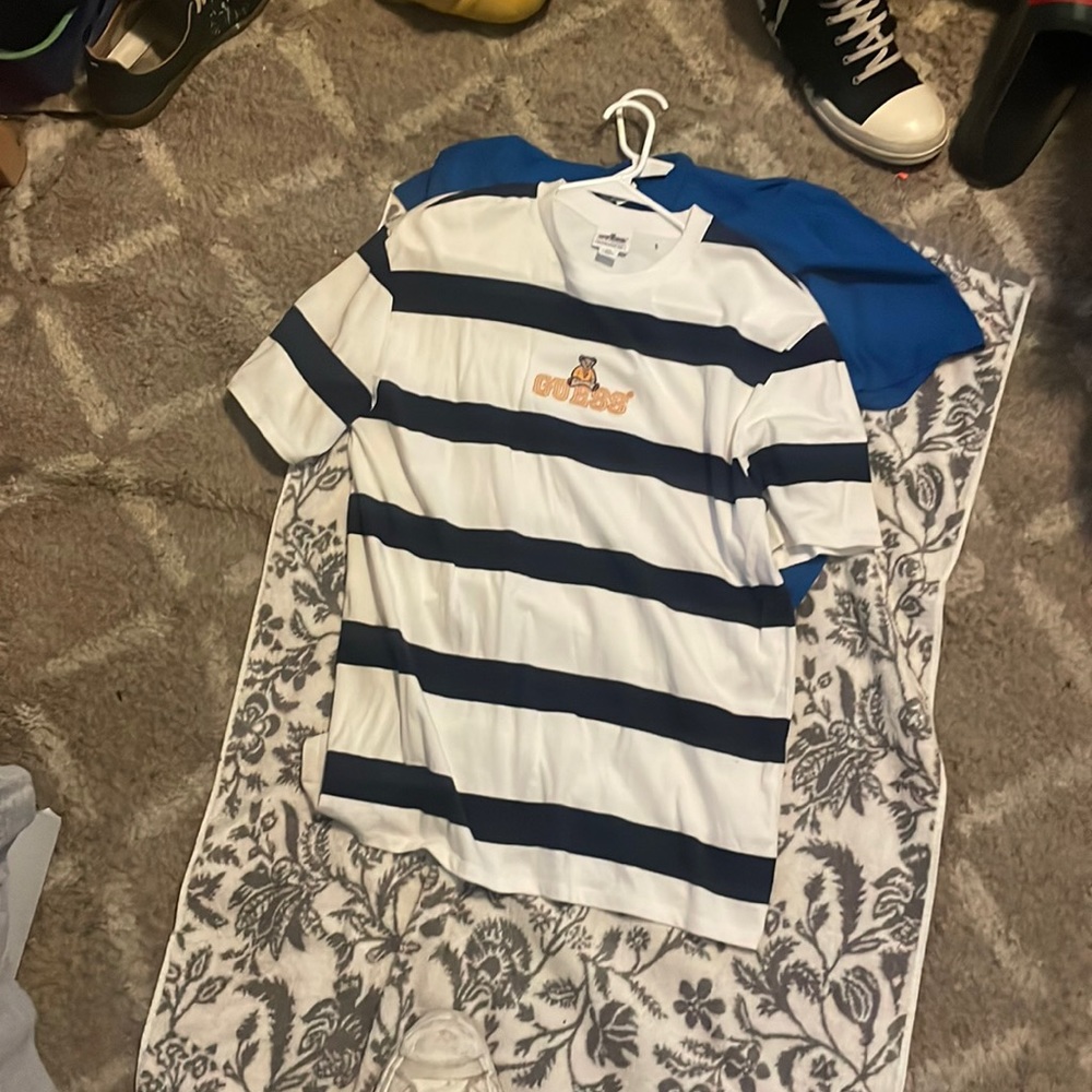 Guess T shirt • Size small but could fit a medium to. • color white and black